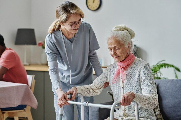 20230926201944 Fpdl.in Young Caregiver Caring About Senior Woman Nursing Home She Helping Her Stand Using Walker 249974 16291 Normal