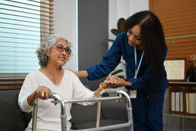 20230926202126 Fpdl.in Friendly Female Caregiver Helping Elderly Woman With Walking Frame Home Home Health Care Service Concept 35674 20815 Normal